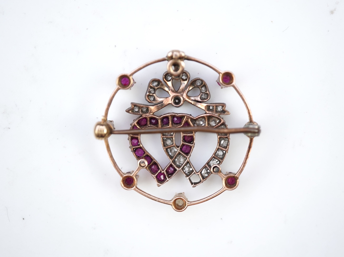 A ruby and diamond brooch, circa 1900